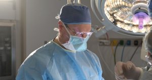 Photo of Dr. Danikas in Surgery Suite