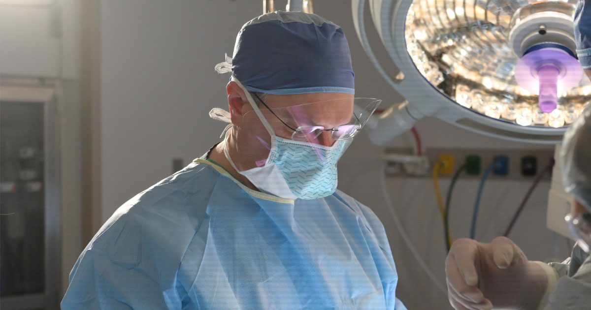 Photo of Dr. Danikas in Surgery Suite