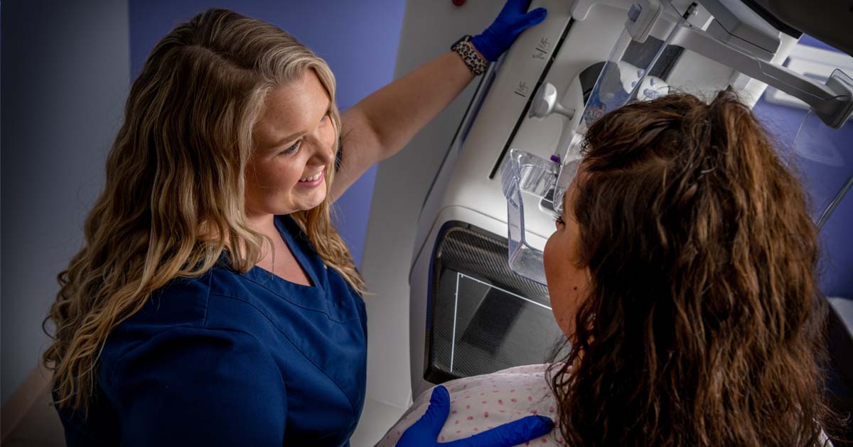 Photo of patient geting a 3-D mammogram.
