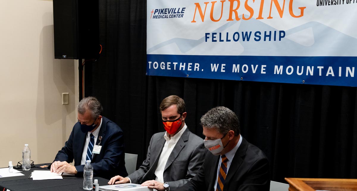 Photo of Donovan Blackburn, Governor Stave Brashear and UPIKE's Dr. Burton Wells at the signing of the Nursing Fellowship agreement.